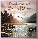 Native american and silver flutes guitar and harps merged with rushing water and undertones of eagles crying sooth away the hectic day               